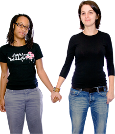 Two women holding hands